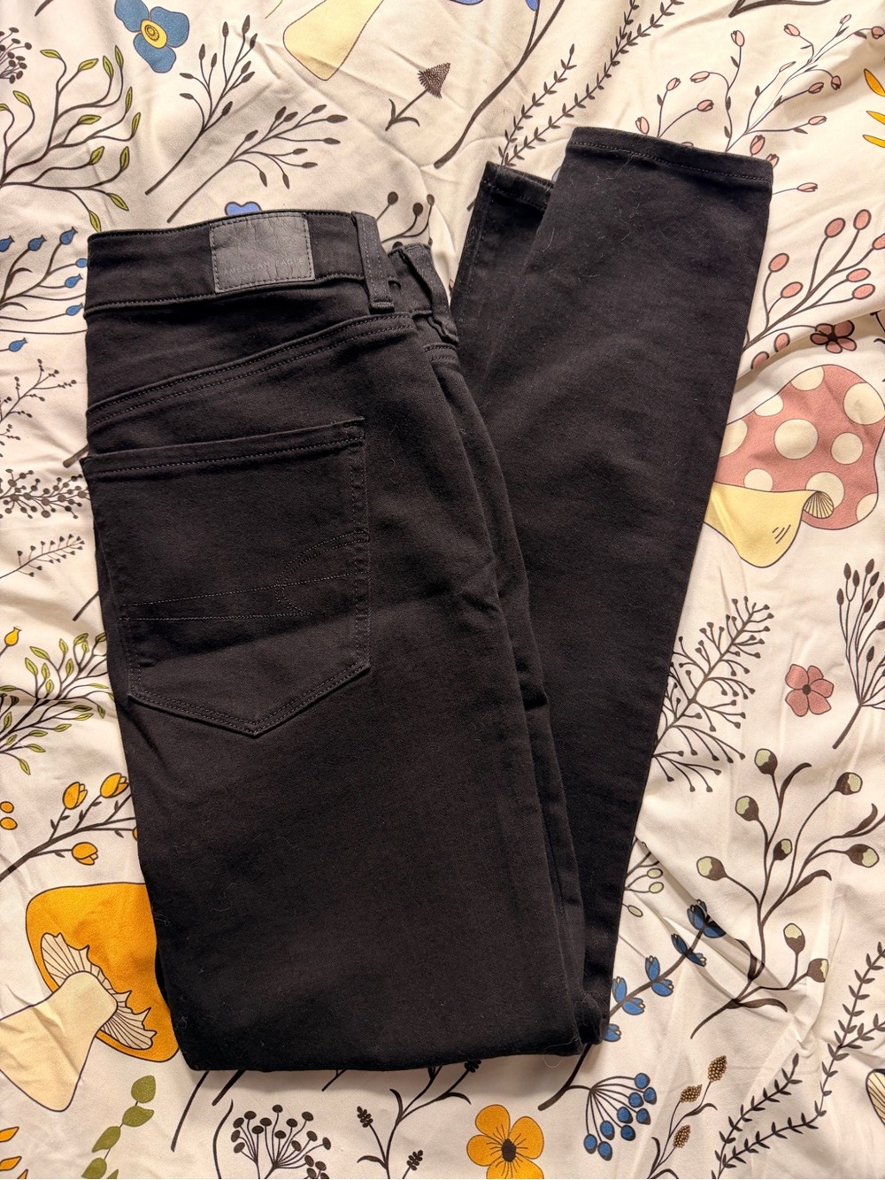 American Eagle Outfitters Black Jeans with Leather Patch